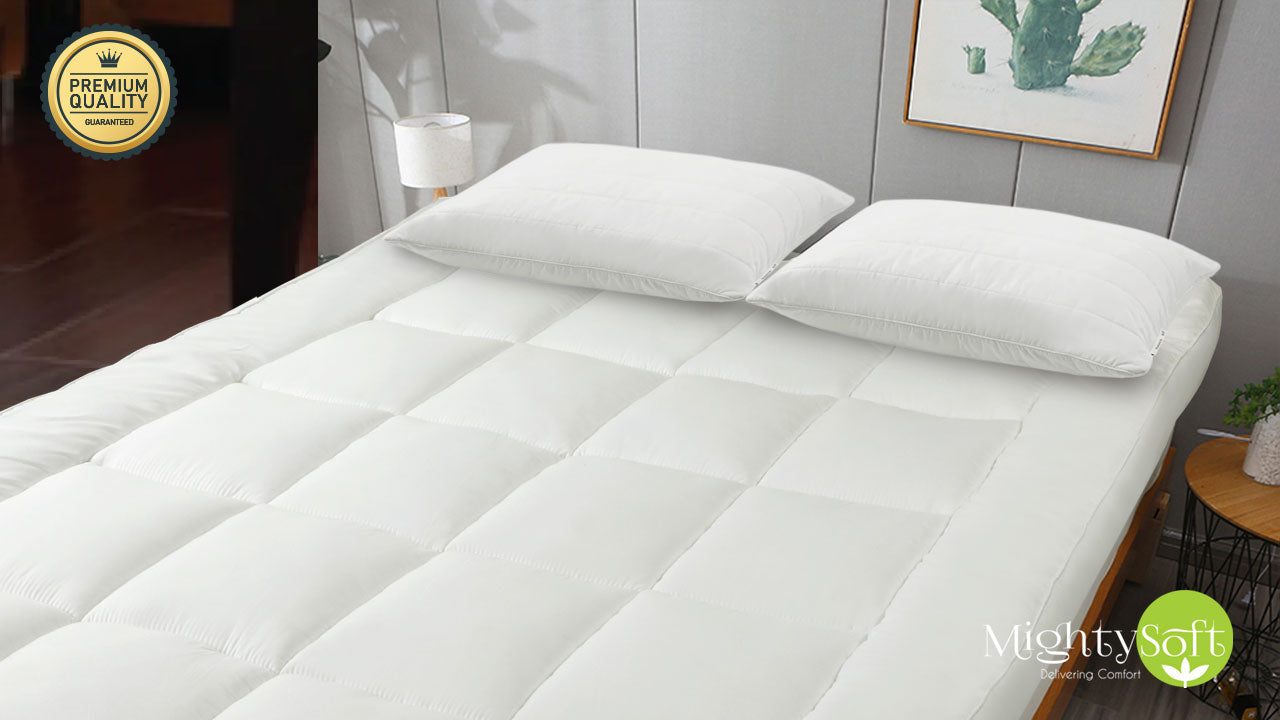 MightySoft mattress topper on a double bed