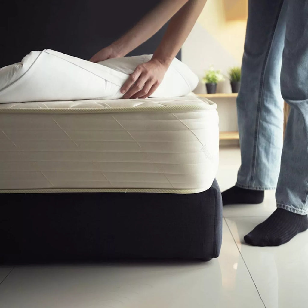 Side view showing the great thickness of a 10cm king size bed topper for back and shoulder support.
