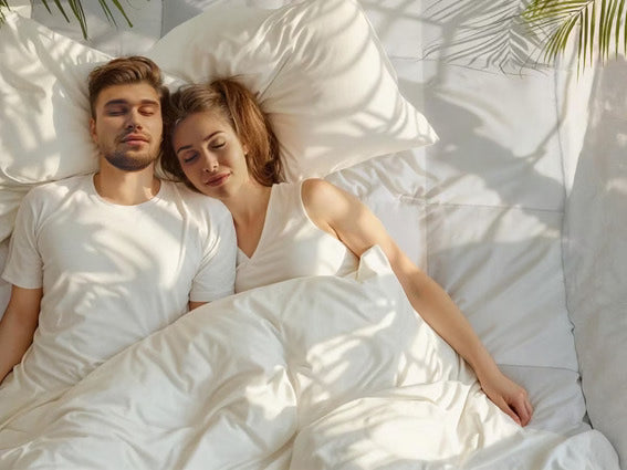 A couple is sleeping peacefully on mattress topper
