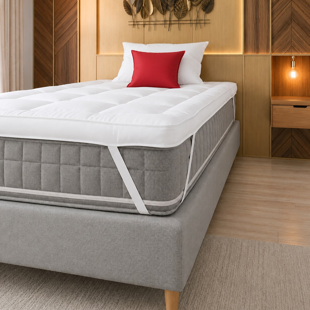 mightysoft small single mattress topper placed on the mattress with elastic straps
