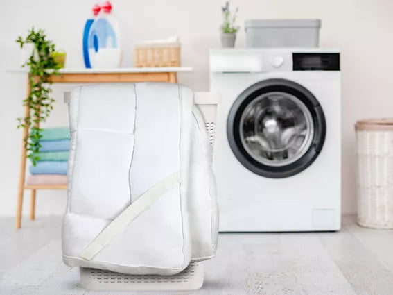 Washable bed topper placed on a laundry basketlaundry-image-mobile.jpg 